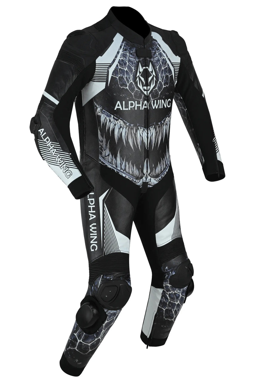 A full-body black and white wetsuit with a shark mouth graphic on the chest, protective knee pads, and 'ALPHA WING' branding printed on the torso and legs.