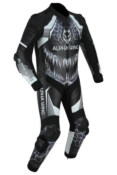 A full-body black and white wetsuit with a shark mouth graphic on the chest, protective knee pads, and 'ALPHA WING' branding printed on the torso and legs.