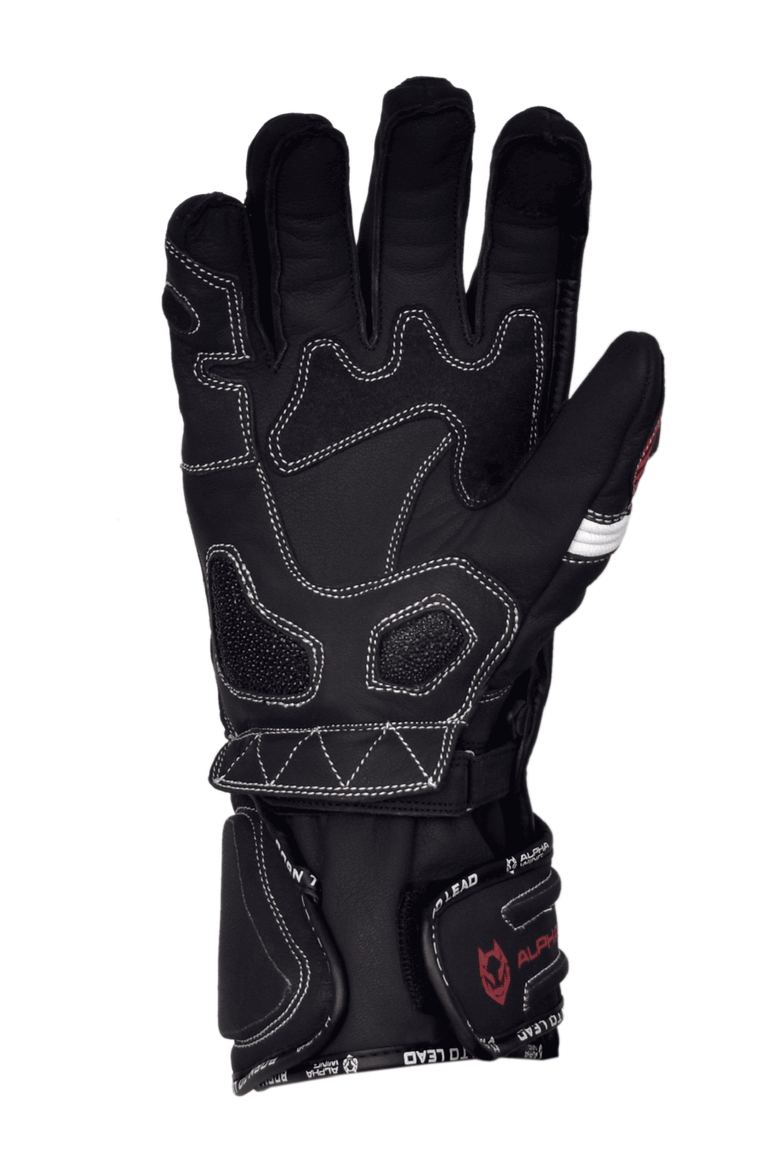 A black winter riding glove with white contrast stitching and red accents, shown from the back on a plain white background.
